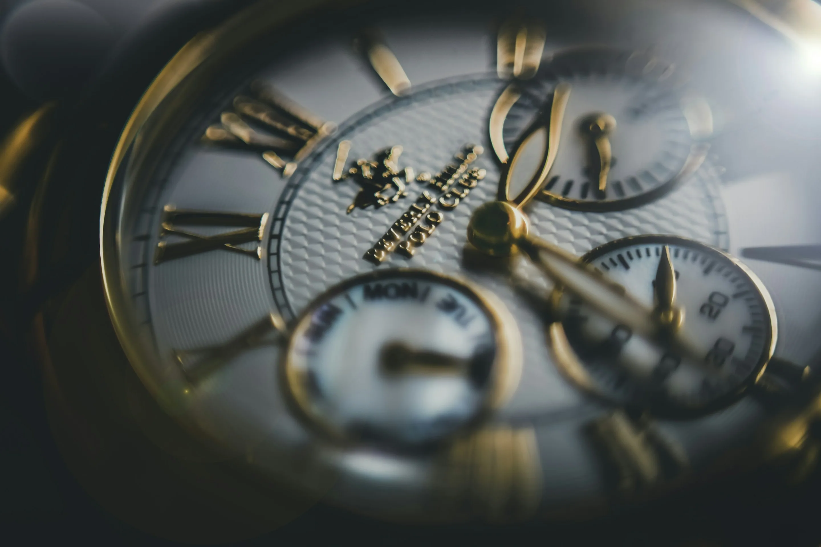 Macro photograph of a chronograph watch